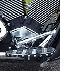 Motorcycle floorboard trim